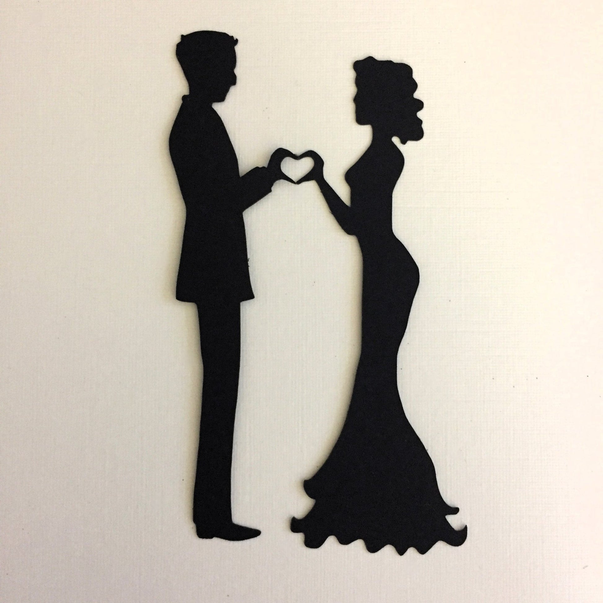 Black Bride and groom die cut making a heart with their hands